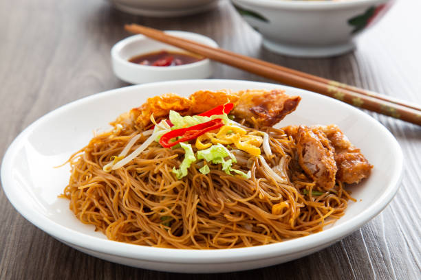 istock Stir-fried Chinese economic rice noodles. 1358708826