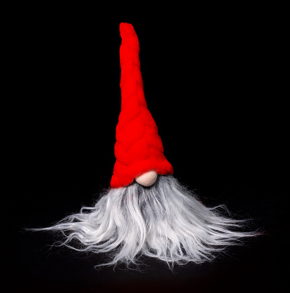 Christmas decoration: Santa Claus head isolated on solid background