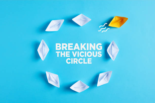 istock One paper boat breaks the vicious circle. Breaking the vicious circle or ending the routine 1358712926