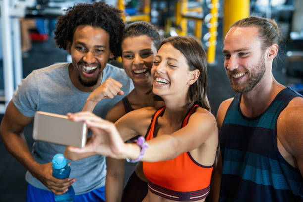 istock Friends making selfie in the gym after workout 1358713347