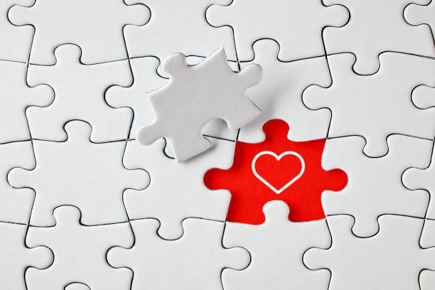 istock A heart shape on missing puzzle piece. To find love 1358715346
