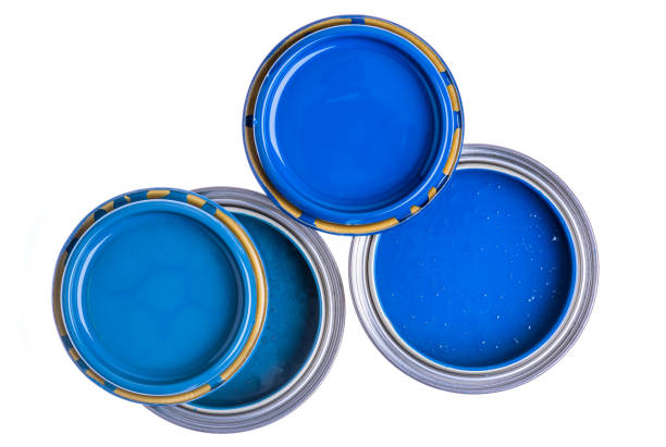istock Opened cans with blue paint top view isolated on white 1358717518