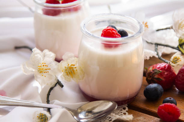 istock yogurt with wild berries on wooden background 1358718403