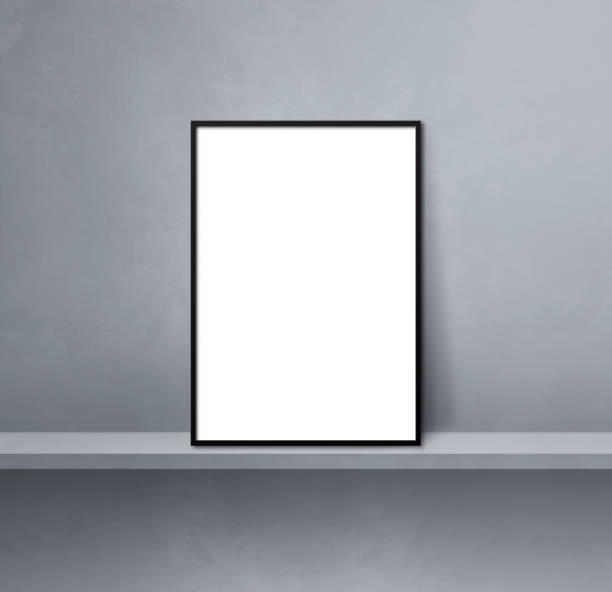 istock Black picture frame leaning on a grey shelf. 3d illustration. Square background 1358718552