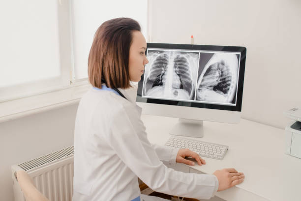 istock Young woman radiologist doctor analysis x-ray 1358723341