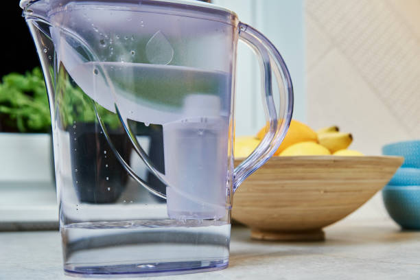 istock Filtered water in water filter 1358727966
