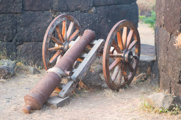 old rusted cannon body at kolaba fort, alibag, maharashtra, india. - maratha imagens e fotografias de stock