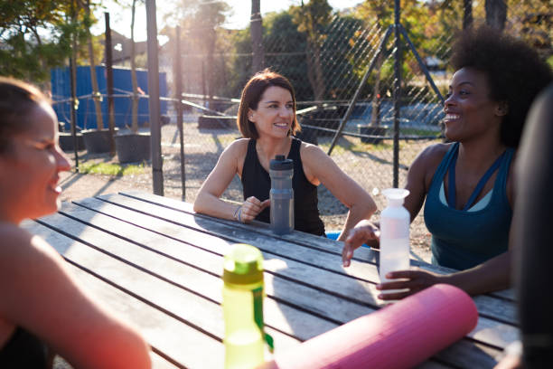 istock A group of friends enjoys a break from a sport session. 1358729716