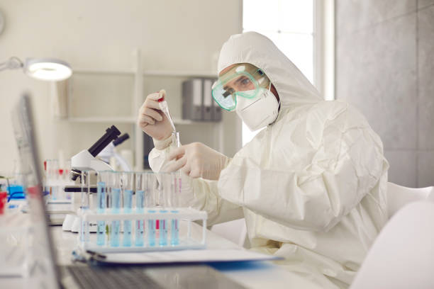 istock High level laboratory scientist in safety coverall conducting research 1358731318