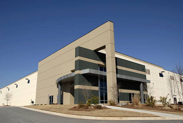 istock Modern front entrance facade of distribution center building 135873251