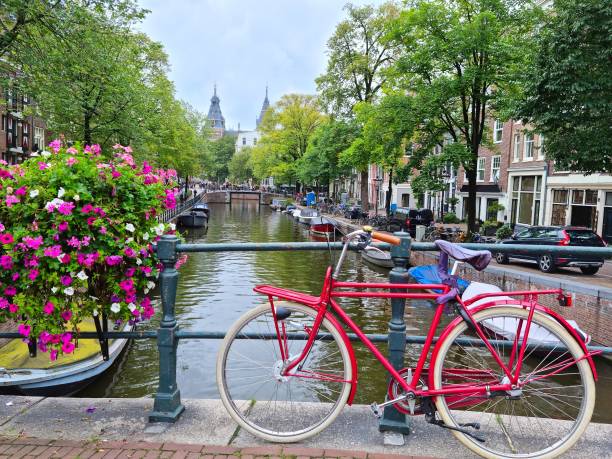 istock Amsterdam canal and bicycles, The Netherlands 1358734565