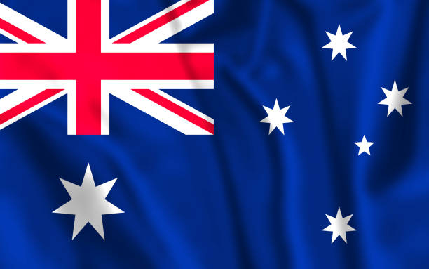 호주 국기를 닫습니다. 바람에 불고 호주 국기. - australian flag flag australia horizontal 뉴스 사진 이미지