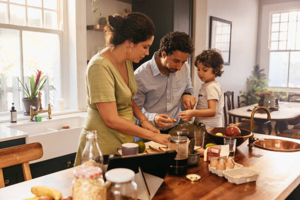 istock Family having breakfast together at home 1358737511
