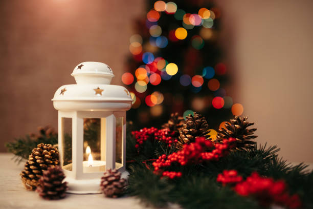 istock Christmas lantern on wooden table 1358737552