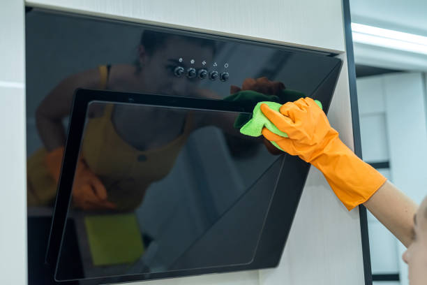 istock pretty young  housewife doing the housework in her kitchen 1358737800