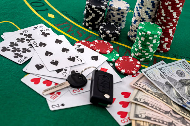 istock car keys poker cards playing chips columns laid out on a green poker table 1358738542