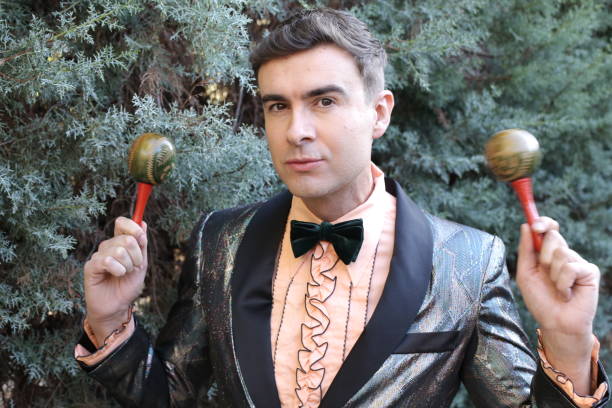 istock Glamorous gentleman playing the maracas 1358739165