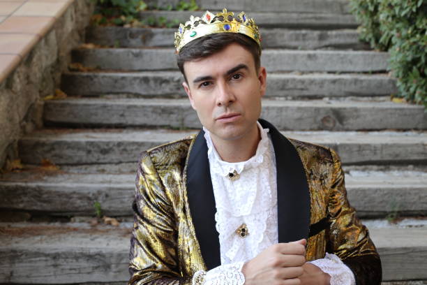 istock Fashionable king dressed in golden outfit 1358739331