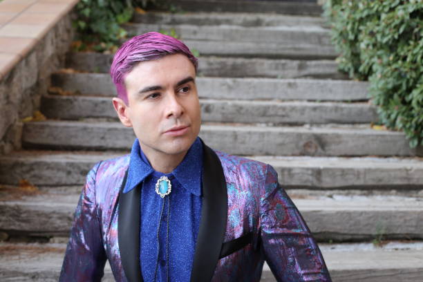 istock Eccentric cowboy with pink hair and bright blazer 1358739367