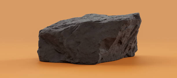 istock Isolated dark rocks in a yellow background for product displays with copy space, 3d Rendering 1358740127
