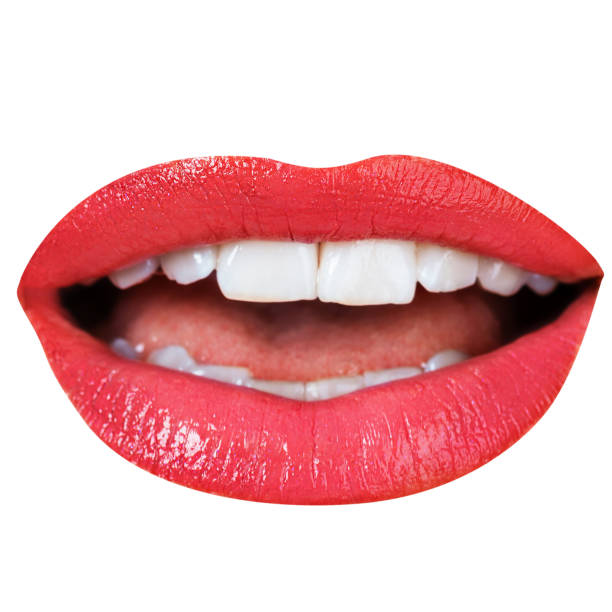 istock Cut out woman lips isolated on white background 1358742373