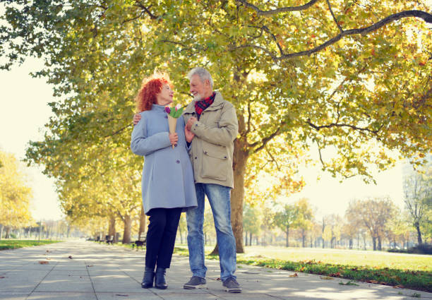 Free Stock Photo of Senior couple standing together in the park ...