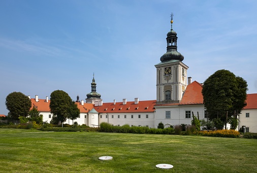 Kutná Hora, Czech Republic, August 24, 2019: View of the former Jesuit College built in the Baroque style in the 17th century. Today it is the Gallery of the Central Bohemian Region. View from the public park.
