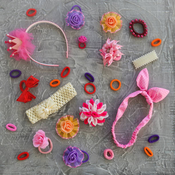 istock Different hair clips on gray background. Flat lay. Top view. 1358744746
