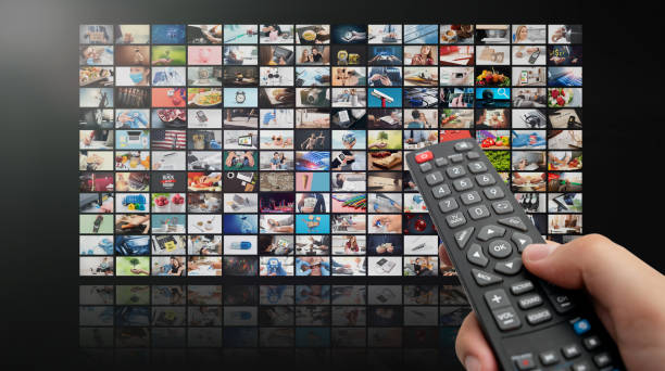 istock Multimedia video concept on media wall, TV stream 1358746286