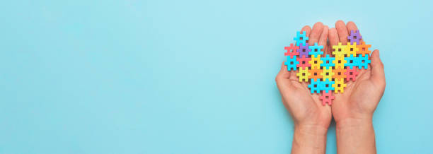 istock Autism spectrum with puzzle concept 1358746329