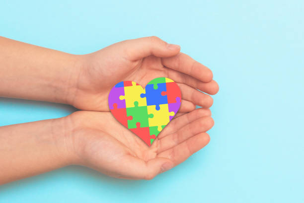 istock Autism spectrum with puzzle concept 1358746341