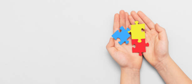 istock Autism spectrum with puzzle concept 1358746348