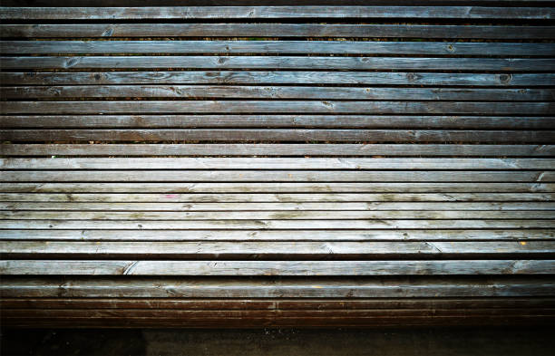 istock Vintage texture of park bench background 1358746443
