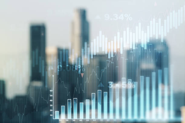 istock Multi exposure of virtual creative financial chart hologram on blurry cityscape background, research and analytics concept 1358752715