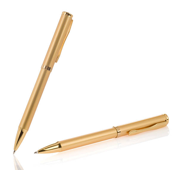 istock gold shining pens isolated on white 135875282