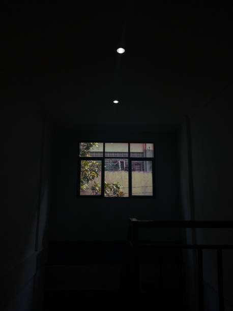 istock Dark room window at home 1358758741