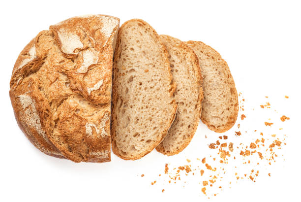 istock Wholegrain Organic  Bread with crumbs  isolated on white background.  Sliced, cutted wheat bread. 1358760175