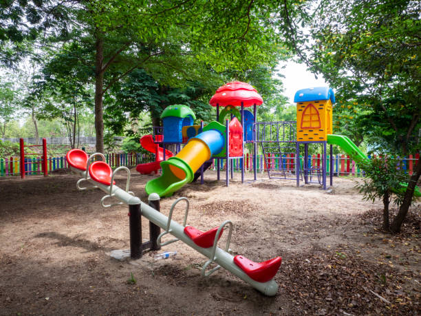 istock Colorful playground on yard in the park. 1358760638