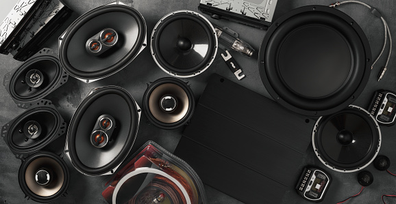 car audio, car speakers, subwoofer and accessories for tuning. Top view. Banner.