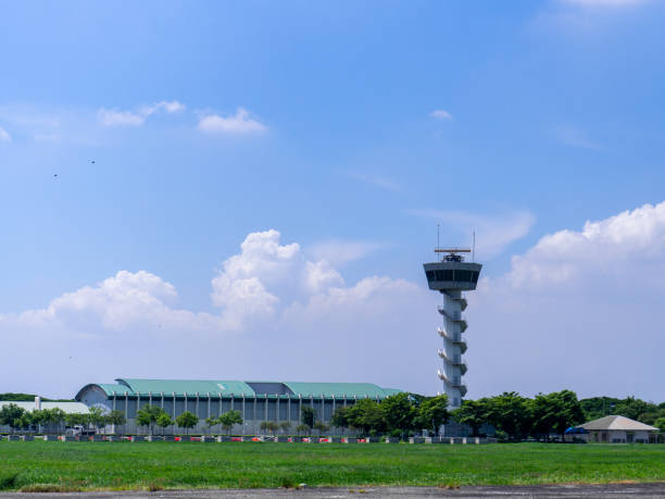 istock control tower at the airport with blue sky and clouds on the background 1358761359