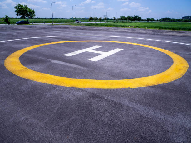 istock Private Helicopter sing parking area in airport 1358761423