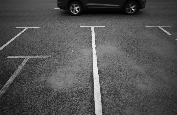 istock Car parking with almost visible vehicle background 1358762172