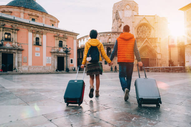 istock Couple visiting Valencia, Plaza de la Virgen 1358763160
