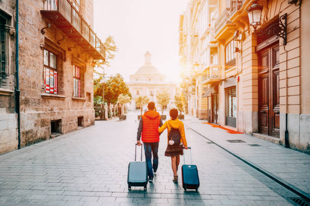 istock Couple visiting Valencia, Plaza de la Virgen 1358763503