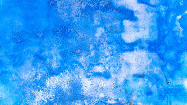 istock Wall flakes blue. Old rough stone on cement pattern wall background. Vintage grunge plaster or concrete stucco surface. Montage product design concept. 1358764133