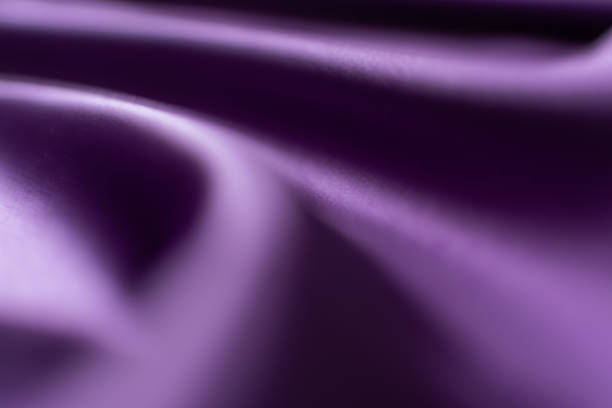 istock Purple satin fabric background 1358764738