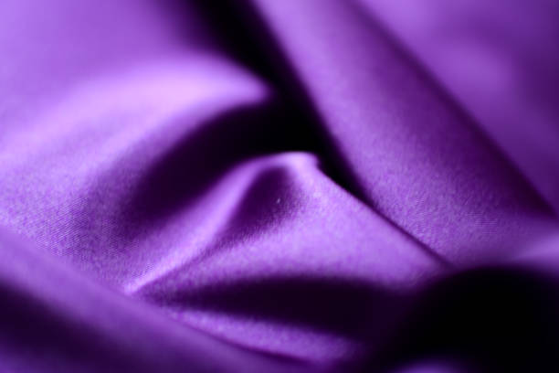 istock Purple satin fabric background 1358764930