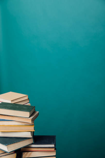 istock educational books for studying in the university library on a green background 1358764944
