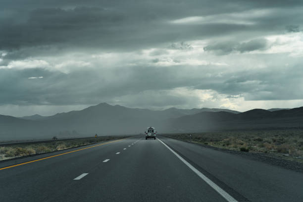istock White recreational vehicle on I-80 EB in Nevada on a cloudy day 1358765531