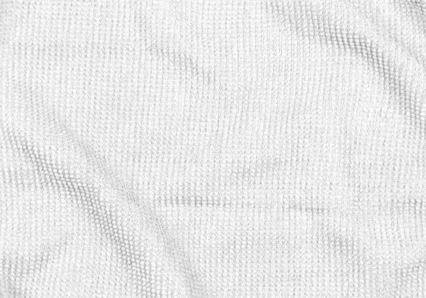 istock White towel close-up background texture. 1358766994
